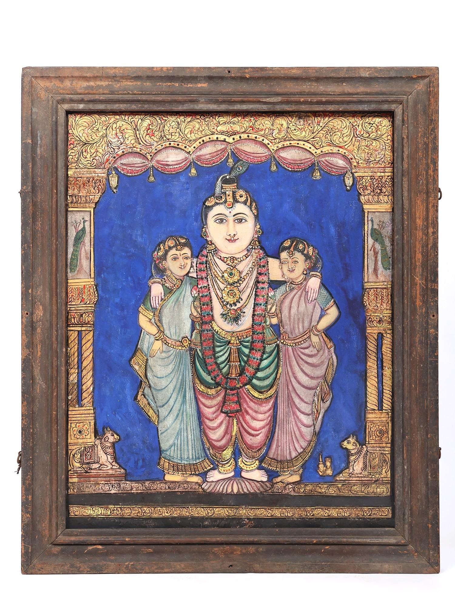 Standing Lord Krishna with Rukmini and Satyabhama | Vintage Tanjore Painting with 24 Karat Gold Work: Title: Standing Lord Krishna with Rukmini and Satyabhama | Vintage Tanjore Painting with 24 Karat Gold Work Description: Tanjore (Thanjavur) Painting Reserve: $3,145.00 Shipping: Domestic: Shipping