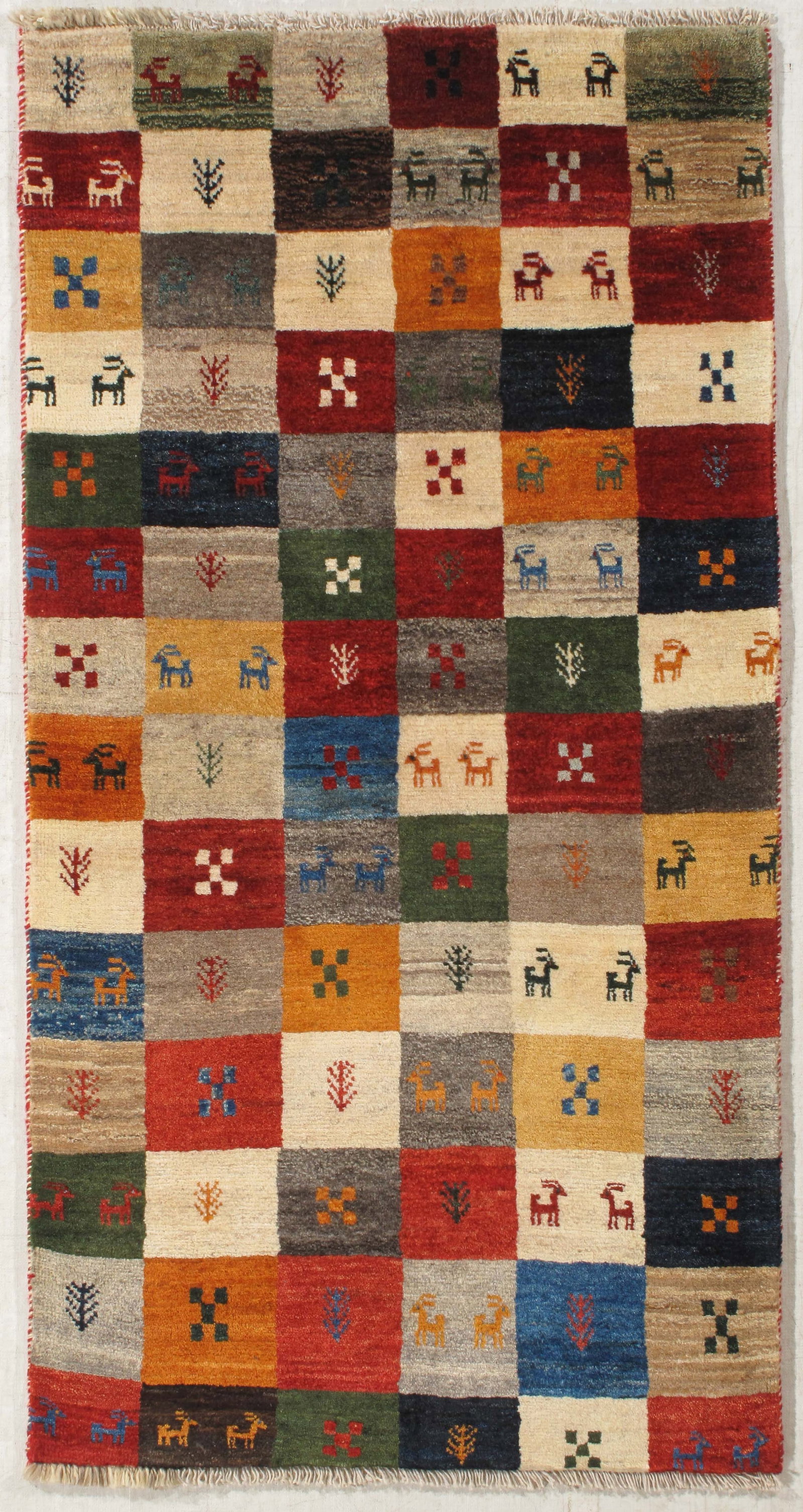 Persian Gabbeh 3.4x6.3: Title:Persian Gabbeh 3.4x6.3 Origin:Iran Year:New Materials:wool Size:3.4x6.3 Description:Persian Gabbeh Reserve: $600.00 Shipping: Domestic: Flat-rate of $80.00 to anywhere within the contiguous