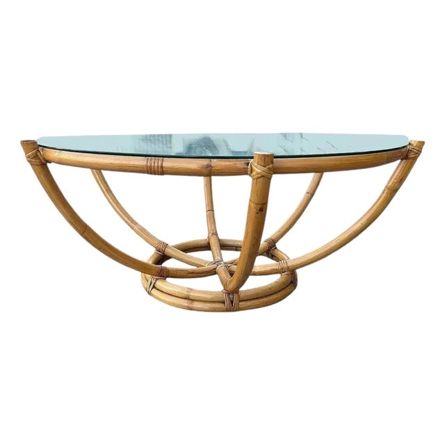 1940s Restored Mid-Century Rattan Six Strand Round Glass Top Spidal Coffee Table: Title: 1940s Restored Mid-Century Rattan Six Strand Round Glass Top Spidal Coffee Table Description: This beautifully restored rattan table blends Modernist style with modern comfort, featuring a Mid-