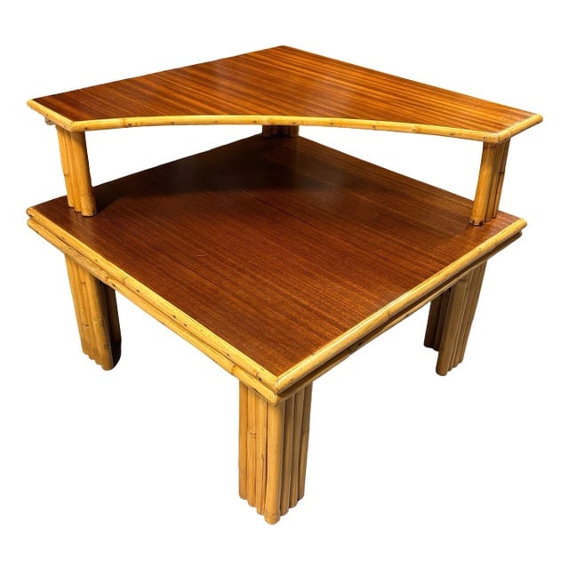1950s Restored Mid-Century Stacked Rattan & Mahogany Two-Tiered Corner Side Table: Title: 1950s Restored Mid-Century Stacked Rattan & Mahogany Two-Tiered Corner Side Table Description: This beautifully restored two-tiered corner side table with vertically stacked legs and a dark-sta