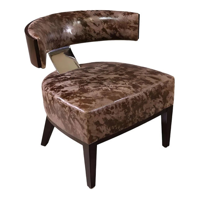 Dakota Jackson "Marina Martini" Lounge Chair: Title: Dakota Jackson "Marina Martini" Lounge Chair Description: Dakota Jackson "Marina Martini" cherry wood Lounge Chair with sculpted legs and a curved backrest connected to the base with a chromed