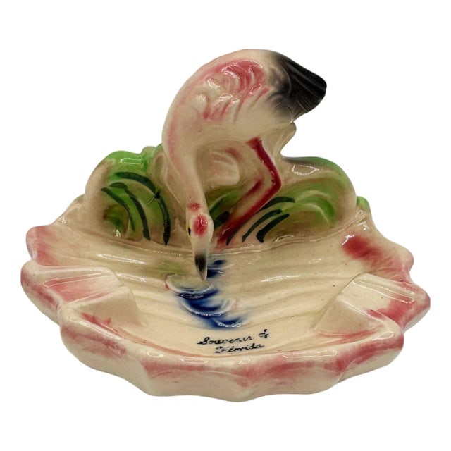 Rare 1948 "Soweru of Florida" Drinking Pink Flamingo Ceramic Ashtray: Title: Rare 1948 "Soweru of Florida" Drinking Pink Flamingo Ceramic Ashtray Description: Mid-century Era pink and green "Soweru of Florida" ceramic ashtray with a drinking flamingo. The ashtray featur
