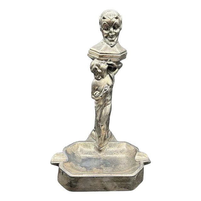1920s Figure Smoking Women With Temptation Devil Figurative Ashtray With Lighter: Title: 1920s Figure Smoking Women With Temptation Devil Figurative Ashtray With Lighter Description: This 1920s white metal table lighter and ashtray features a Devil/Satyr bust above a smoking nymph