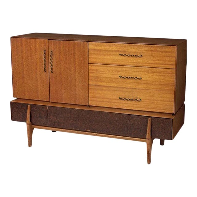 John Keal Buffet or Credenza for Brown Saltman: Title: John Keal Buffet or Credenza for Brown Saltman Description: This Mid-Century Modern buffet/credenza by John Keal for Brown Saltman features three storage drawers and a cabinet behind a pair of 