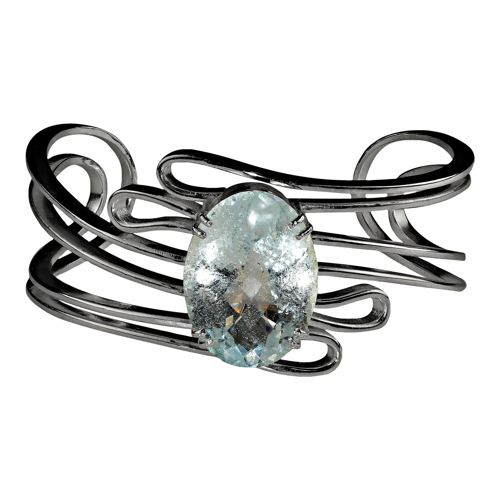 25 Carat Oval Aquamarine in Sterling Bracelet: This is part of Chairish's Fine Jewelry assortment. Enchanting 25-Carat Aquamarine Cuff Bracelet Discover the exquisite beauty of this magnificent cuff bracelet, featuring a stunning 25-carat oval