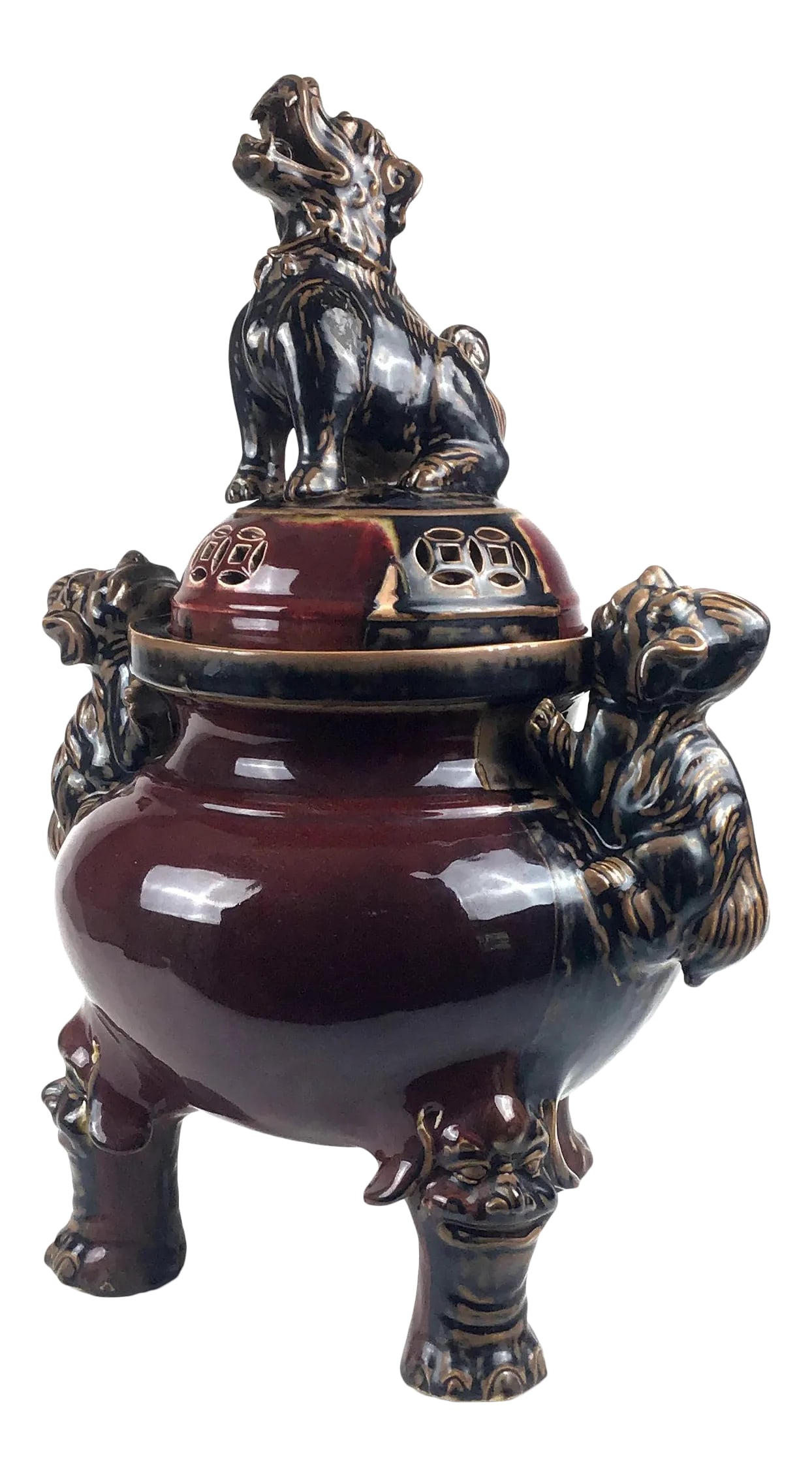 Large Chinese Porcelain Foo Dog Lion Incense Burner: A beautiful, unique Chinese Foo Dog ceremonial incense burner. The large heavy pottery/porcelain is heavily glazed with a gorgeous burgundy bloodstone color. The lid is decorated with an open circle