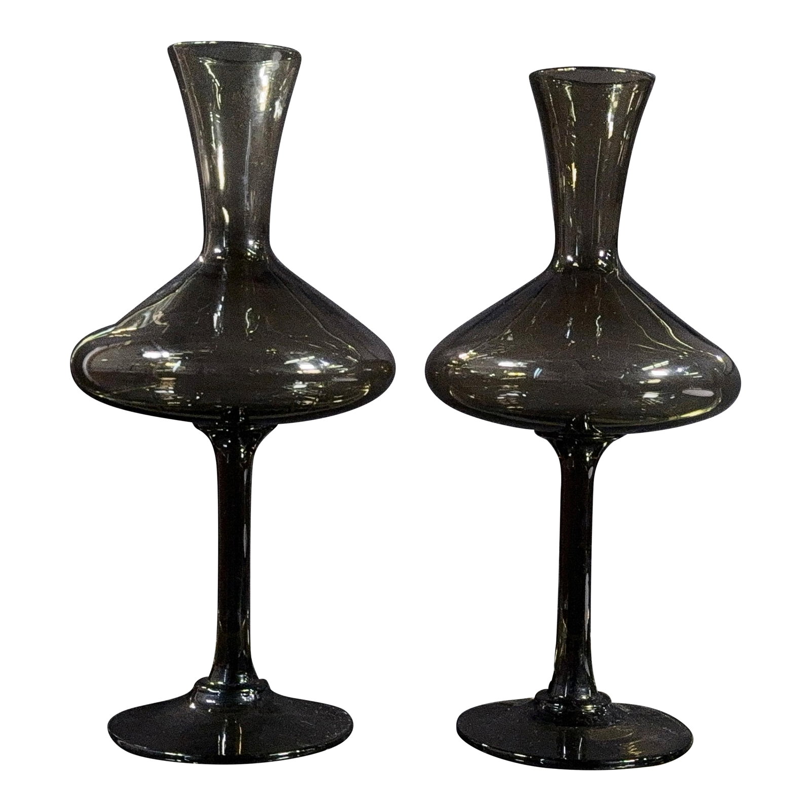 Vintage Balboa Venetian Smoked Glass Footed Decanters / Vases Handmade in Italy - A Pair: This pair of handmade Italian smoked glass vessels by Balboa combines a wide flared decanter body with a tall slender stem and circular foot, giving each piece a dramatically sculptural silhouette.