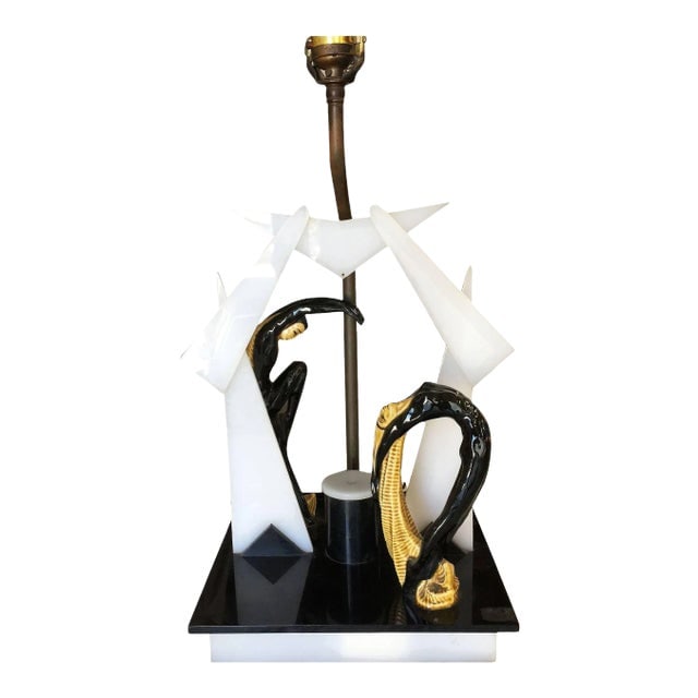 Mid-Century Dancers Acrylic Sculptural Lamp by Moss: Title: Mid-Century Dancers Acrylic Sculptural Lamp by Moss Description: Mid-Century "Dancers" Lucite lamp by Moss featuring a handcrafted acrylic lamp with decorative ceramic dancers statue in the mid