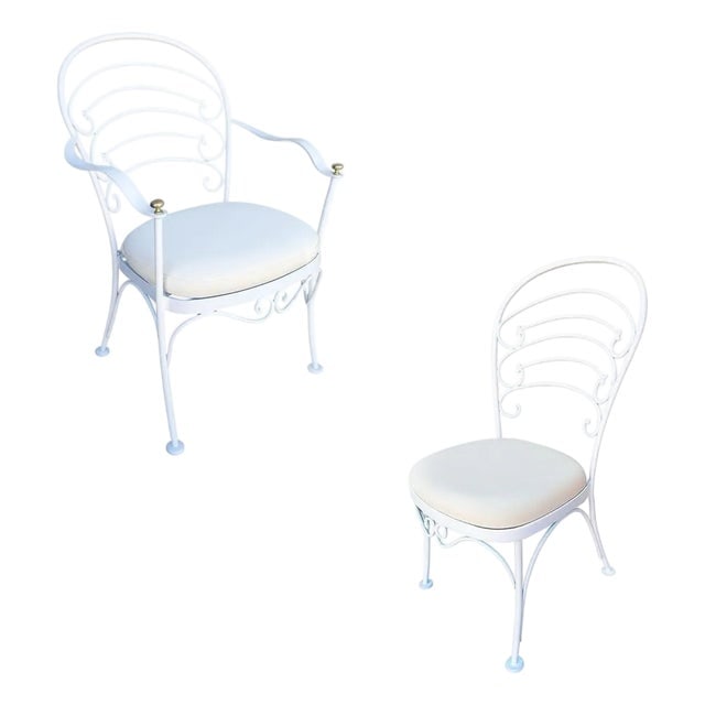 1950s Restored "Ribcage" Patio/Outdoor Lounge Chair, Set of Two: Title: 1950s Restored "Ribcage" Patio/Outdoor Lounge Chair, Set of Two Description: A set of two Woodard rod iron "Ribcage" outdoor/patio featuring one armchair and one side chair. This chair is const