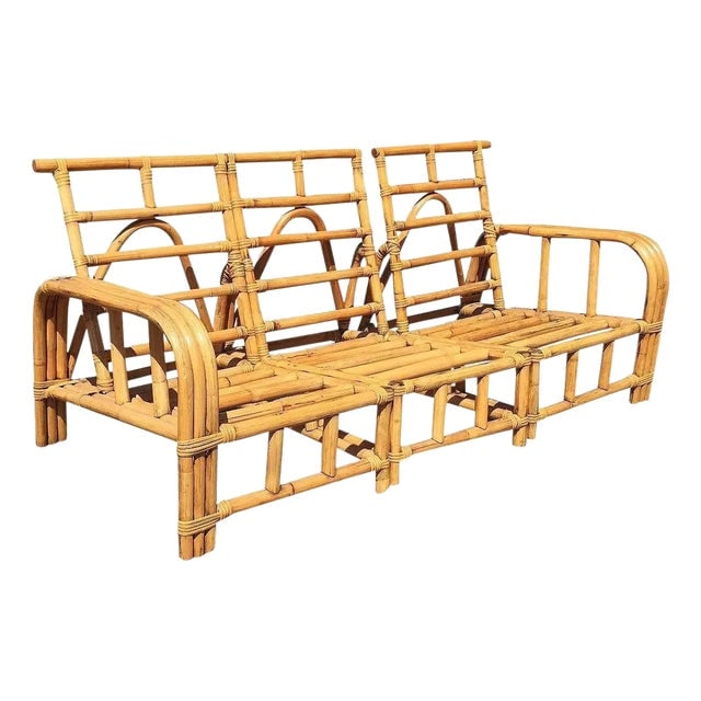 1950s Restored Mid-Century Child Size Three-Strand "Horse Shoe Arm" Sofa: Title: 1950s Restored Mid-Century Child Size Three-Strand "Horse Shoe Arm" Sofa Description: This beautifully restored rare child-sized rattan sectional sofa is crafted with Frankl style 3-strand