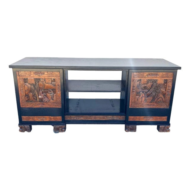 1950s Mid-Century James Mont Style Carved Media Credenza Stereo Cabinet: Title: 1950s Mid-Century James Mont Style Carved Media Credenza Stereo Cabinet Description: This beautifully restored Mid-century Credenza Media Console with hand-carved asian scenics along the front 