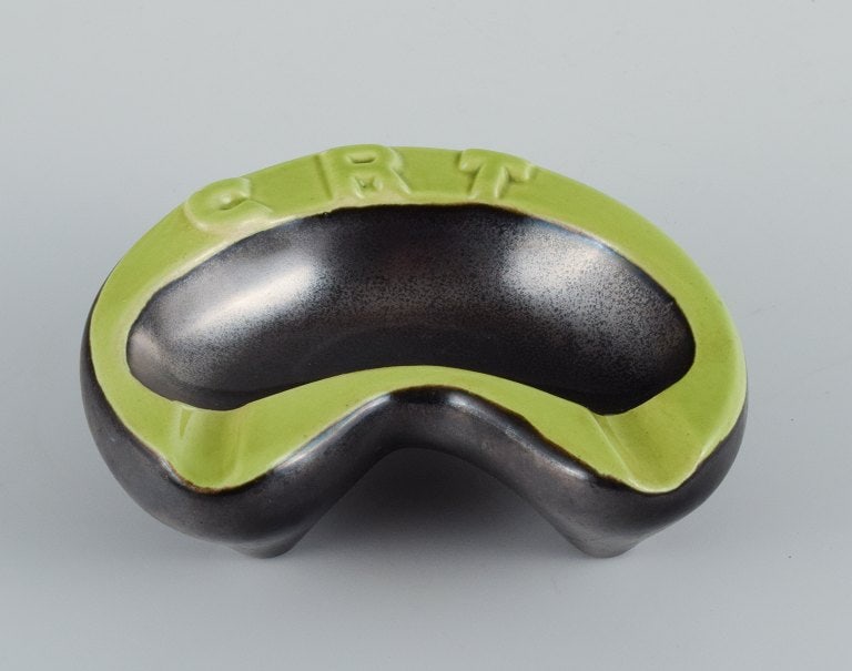 Vallauris, France, two ceramic bowls with yellow and green glazes on a black base. - 6