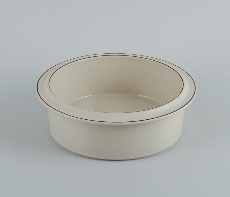 Arabia, Findland, Fennica bowl in stoneware. Approx. 1970s: Arabia, Findland, Fennica bowl in stoneware. Approx. 1970s In perfect condition. Marked. Measuring: D 23.0 x H 8.0 cm. Reserve: $168.00 Shipping: Domestic: Shipping rates are determined by