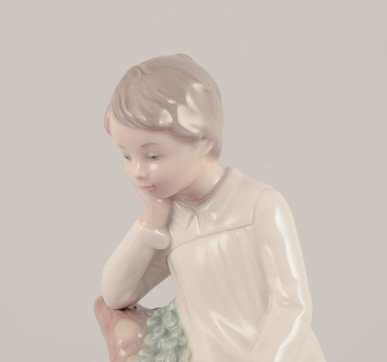 Lladro, Spain. Porcelain figurine of a girl sitting on a tree stump. - 7