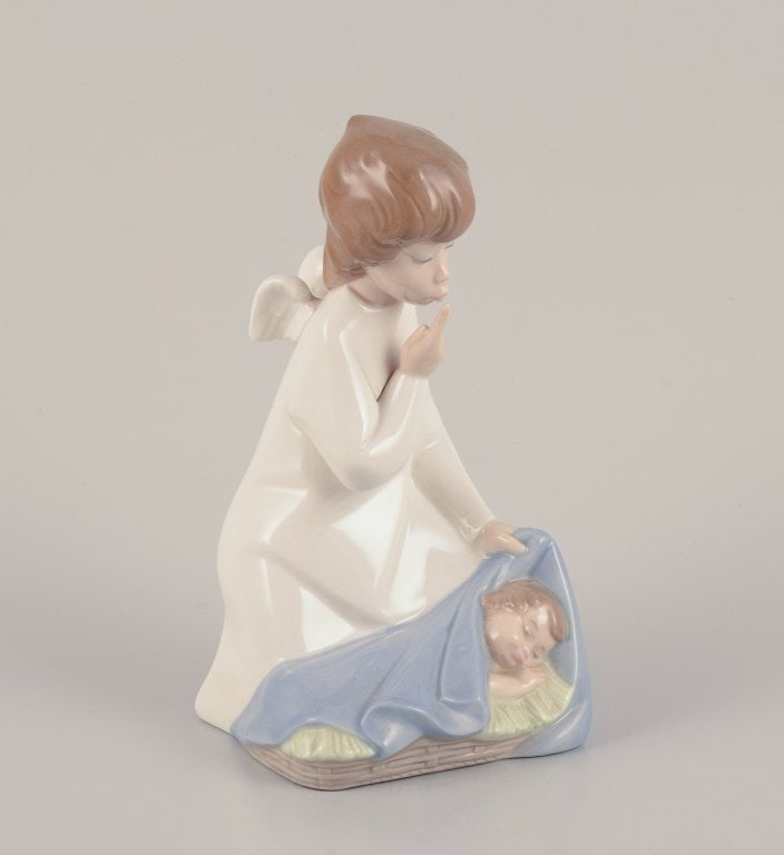 Lladro, Spain. Two porcelain figurines. Girl with a nightstand lamp and an angel figurine with a - 7