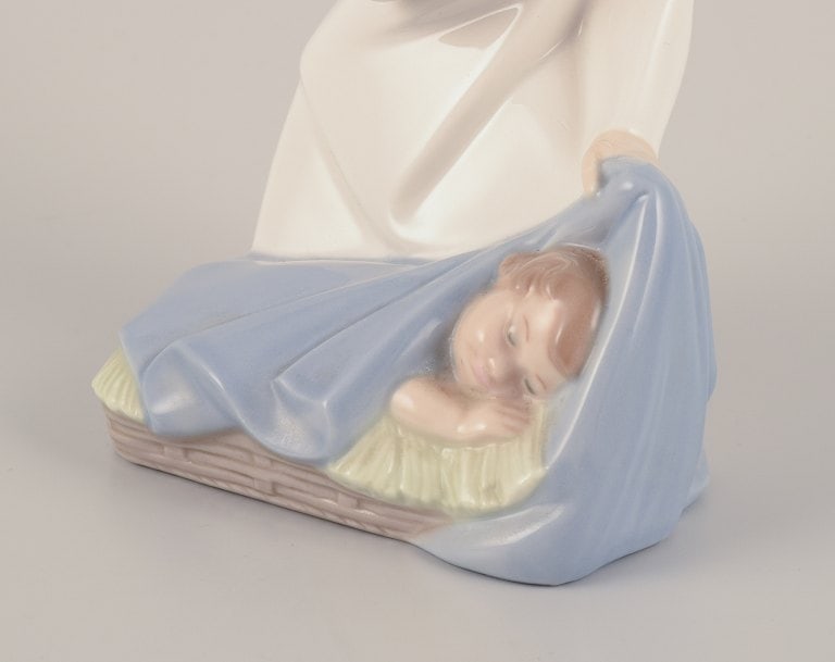 Lladro, Spain. Two porcelain figurines. Girl with a nightstand lamp and an angel figurine with a - 9