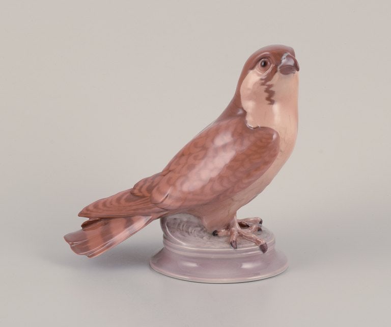 Dahl Jensen for Bing & Grøndahl, porcelain figurine of a kestrel.: Dahl Jensen for Bing & Grøndahl, porcelain figurine of a kestrel. Model 1666. Mid-20th century. Marked. First factory quality. In excellent condition with minor restoration on the back of the tai
