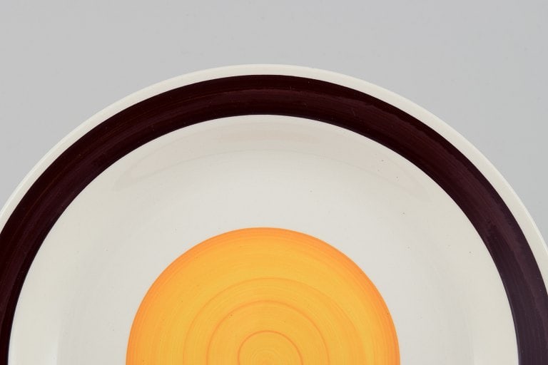 Carl Harry Stålhane (1920-1990) for Rörstrand, Sweden. A set of eight "Solöga" (Sun - 4