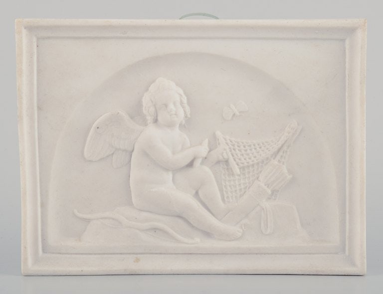 Bertel Thorvaldsen for Bing & Grøndahl. Amor makes a net. Biscuit relief. - 2