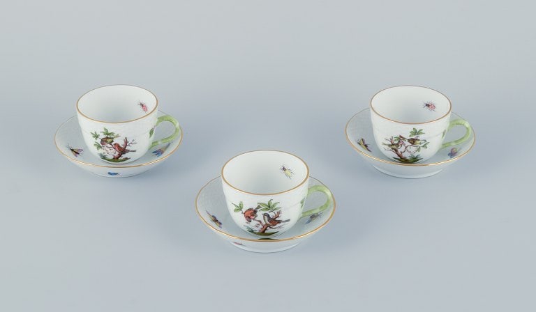 Herend, Hungary. Three porcelain coffee cups with saucers hand-painted with butterflies and birds on - 2
