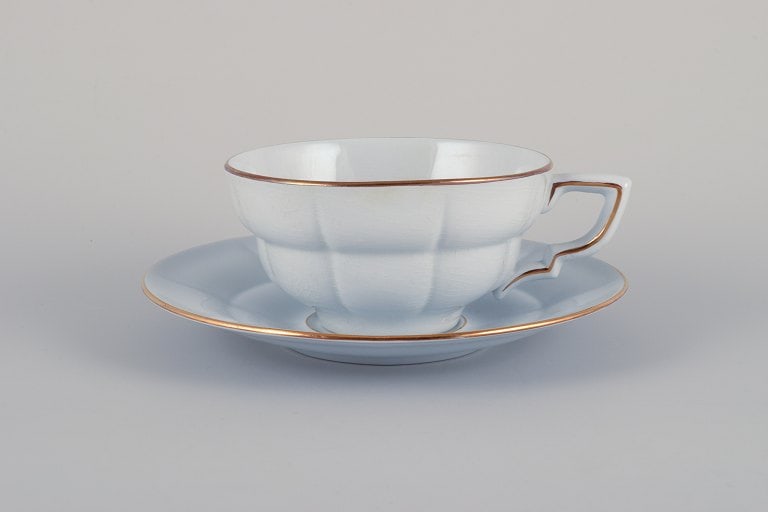 Gefle, Sweden, a set of four "Grand" Art Deco teacups with matching saucers. Light blue faience with - 4
