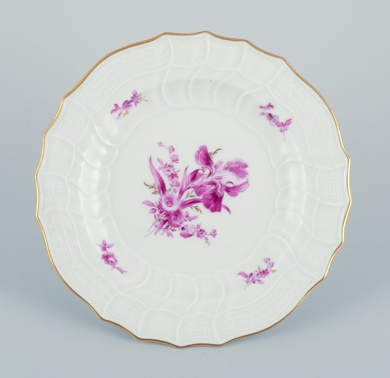 Meissen, Germany. A set of seven porcelain plates hand-painted with purple flower decoration and - 6