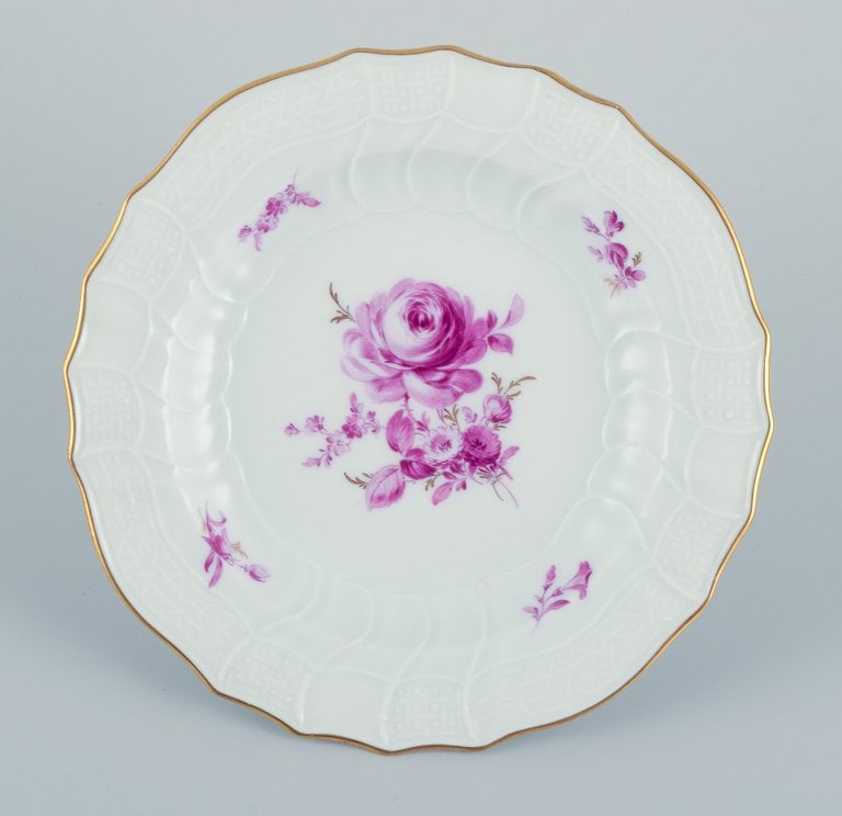 Meissen, Germany. A set of seven porcelain plates hand-painted with purple flower decoration and - 8