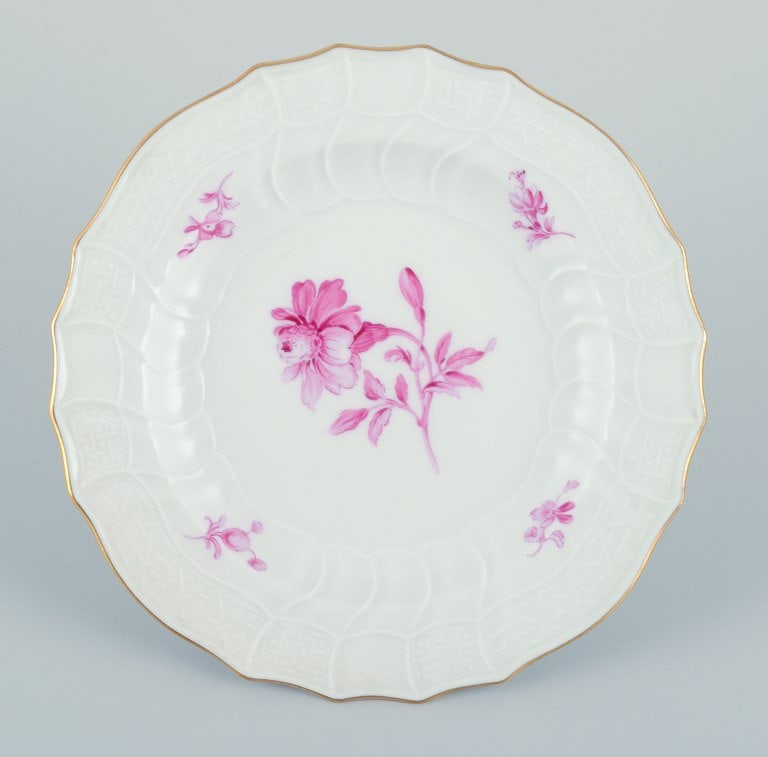 Meissen, Germany. A set of seven porcelain plates hand-painted with purple flower decoration and - 9