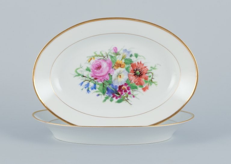 Bing & Grondahl, two oval platters hand-painted with polychrome flower motifs and gold trim. - 2