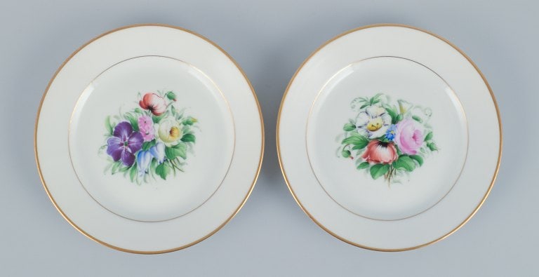 Bing & Grondahl, a set of fourteen plates hand-painted with various polychrome flower motifs and - 4