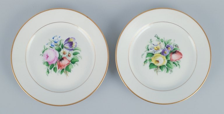 Bing & Grondahl, a set of fourteen plates hand-painted with various polychrome flower motifs and - 7