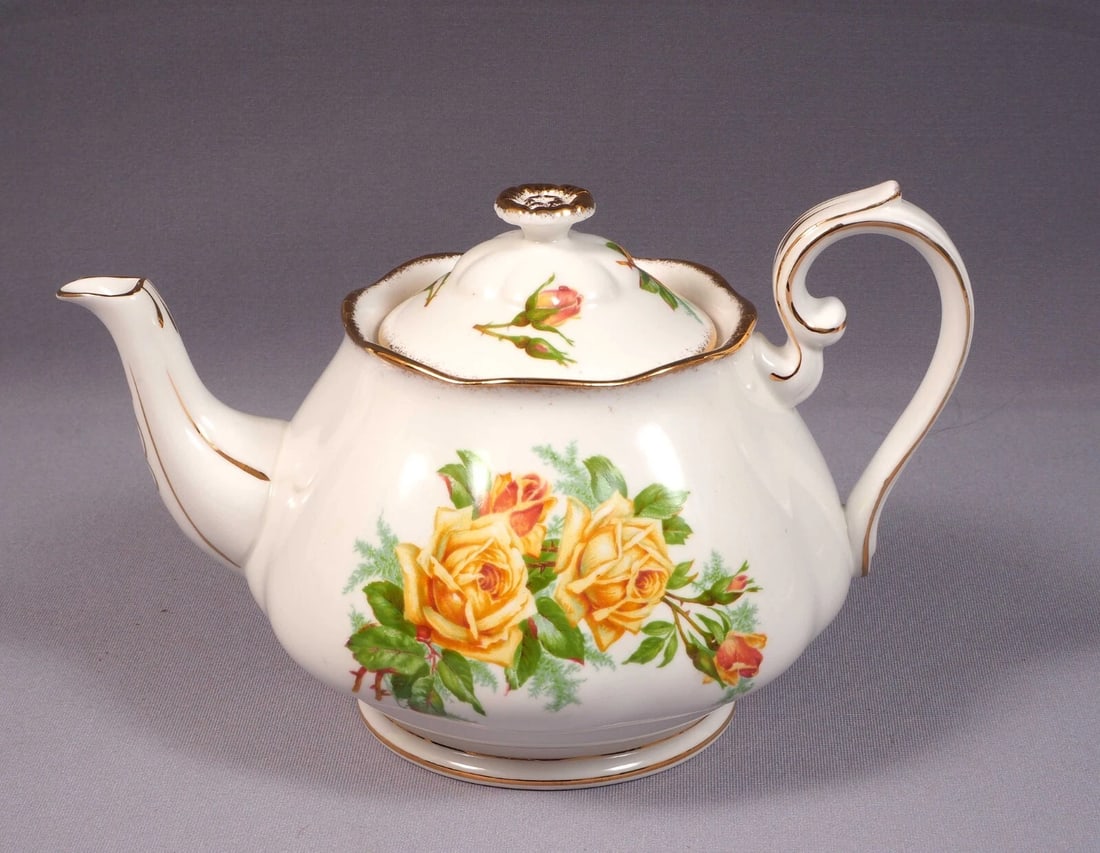 Royal Albert Yellow Tea Rose Coffee Tea Pot Teapot England Vintage: This is a stunning Bone China LARGE Tea/Coffee pot. It is from the famous Yellow Tea rose Collection. The pot is made by Royal Albert in England. It is properly marked with Royal Albert back stamp and