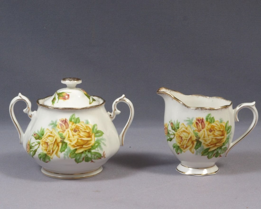 Royal Albert Yellow Tea Rose Cream Milk Creamer Jug Covered Sugar bowl LARGE: This is a stunning set of LARGER Creamer/Milk jug and lidded sugar bowl, from the famous Yellow Tea rose Collection. The set is made by Royal Albert in England. It is properly marked with Royal Albert