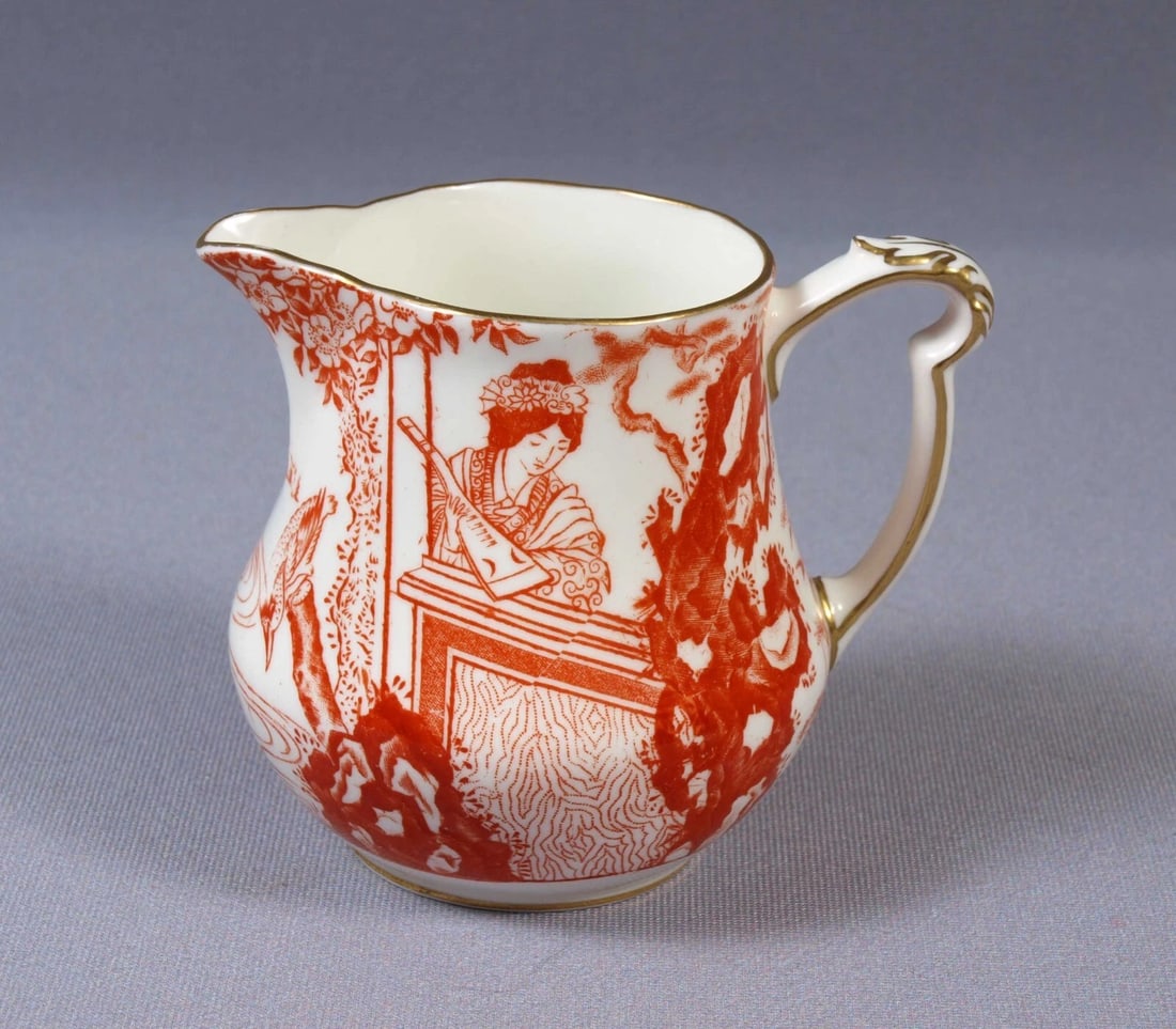 Royal Crown Derby RED Mikado Milk Jug Cream Creamer Pot Bone china 1930 RARE: This beautiful, Bone china Milk/Cream Jug is made by Royal Crown Derby in their famous Mikado collection. It is in the rare RED variation of the pattern. The Mikado pattern was designed in 1894 by Roy