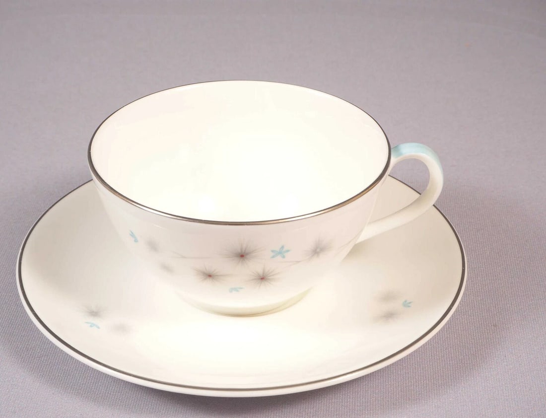 Royal Doulton Thistledown Coffee Tea Cup Saucer England H4943: This is a gorgeous Coffee/Tea Cup and Saucer set. It is from the Thistledown pattern by Royal Doulton - Made in England. The set is properly marked with the Royal Doulton mark and name of the pattern.