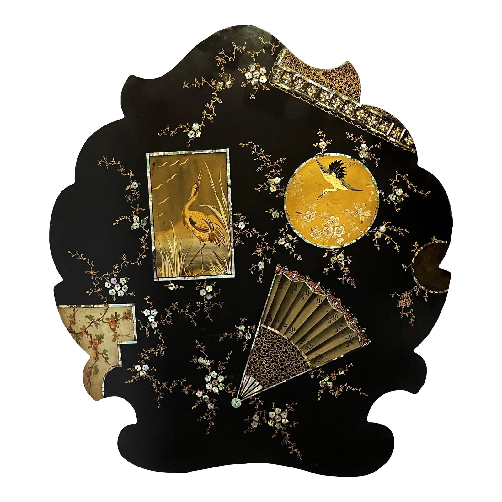 Early 20th Century Papier Mâché Decorative Wall Plaque With Mother-Of-Pearl Inlay: Beautifully crafted early 20th century papier mâché decorative wall plaque. It has hand painted gold designs on an ebony background with heron, crane and fan motifs. Flecks of