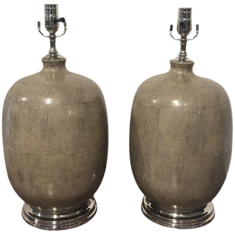 Late 20th Century Shagreen Porcelain Vases, Now as Lamps - a Pair: Pair of Shagreen porcelain vases now as lamps, finely painted with bookmatched shagreen pattern, with silver plated mounts. New wiring. Each lamp stands 20" H to the top of the socket, 16" high to