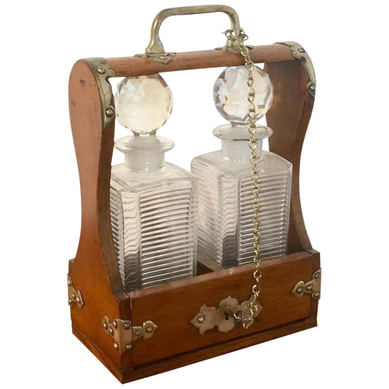 Mid 19th Century Mappin Bros. Small Tauntless With Cut Glass Decanters: Mappin Bros. diminutive tauntless with cut glass decanters, complete with attached key, original 8" x 3" panel cut glass decanters, with brass inset plaque "Mappin Bros. 67 & 68, King William Street, 