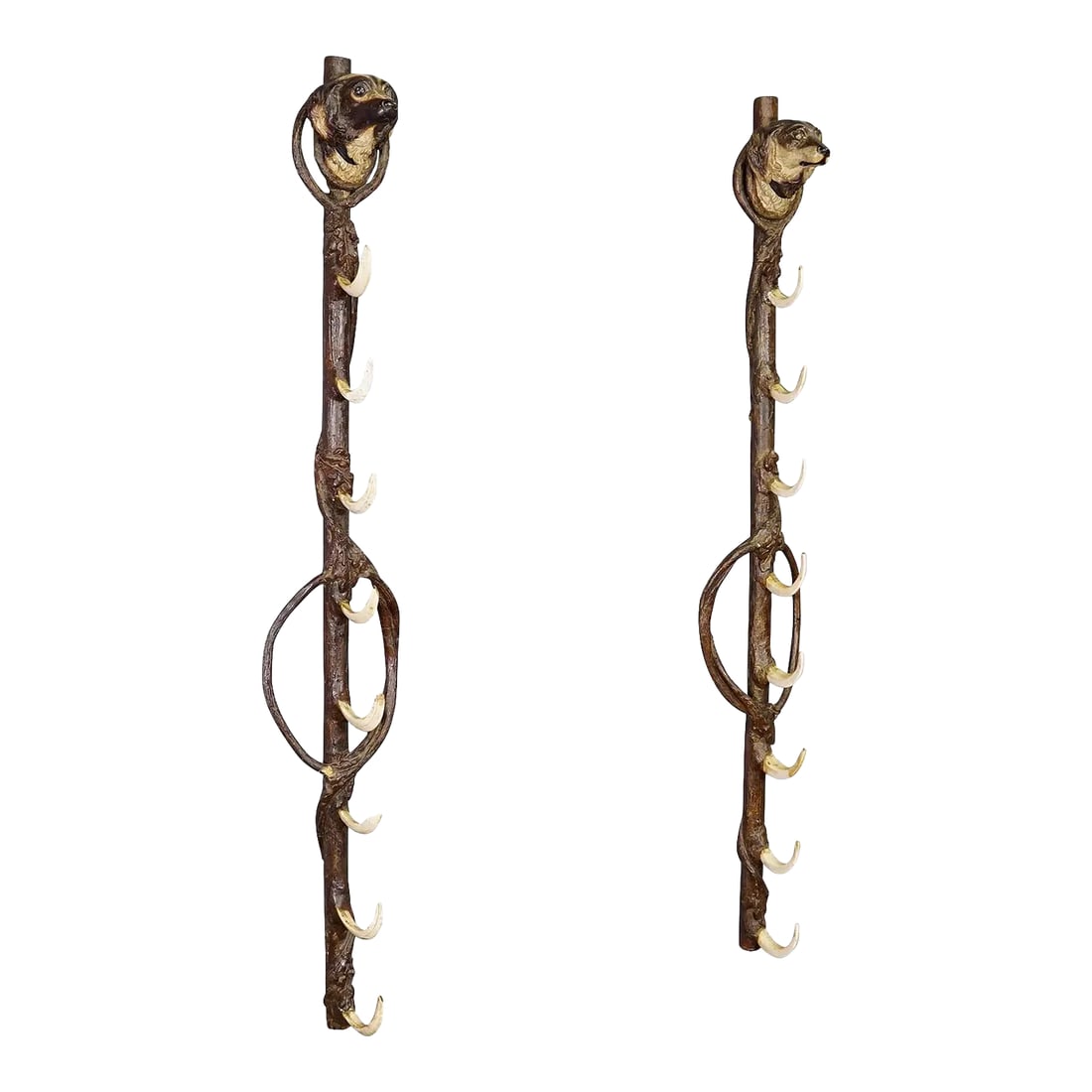A Pair Antique Black Forest Gun Holders, Austria Late 19th Century: A Pair Antique Black Forest Gun Holders, Austria late 19th Century An antique pair of Black Forest gun holders mounted side by side on the wall. They consist of a wooden rod covered with resin