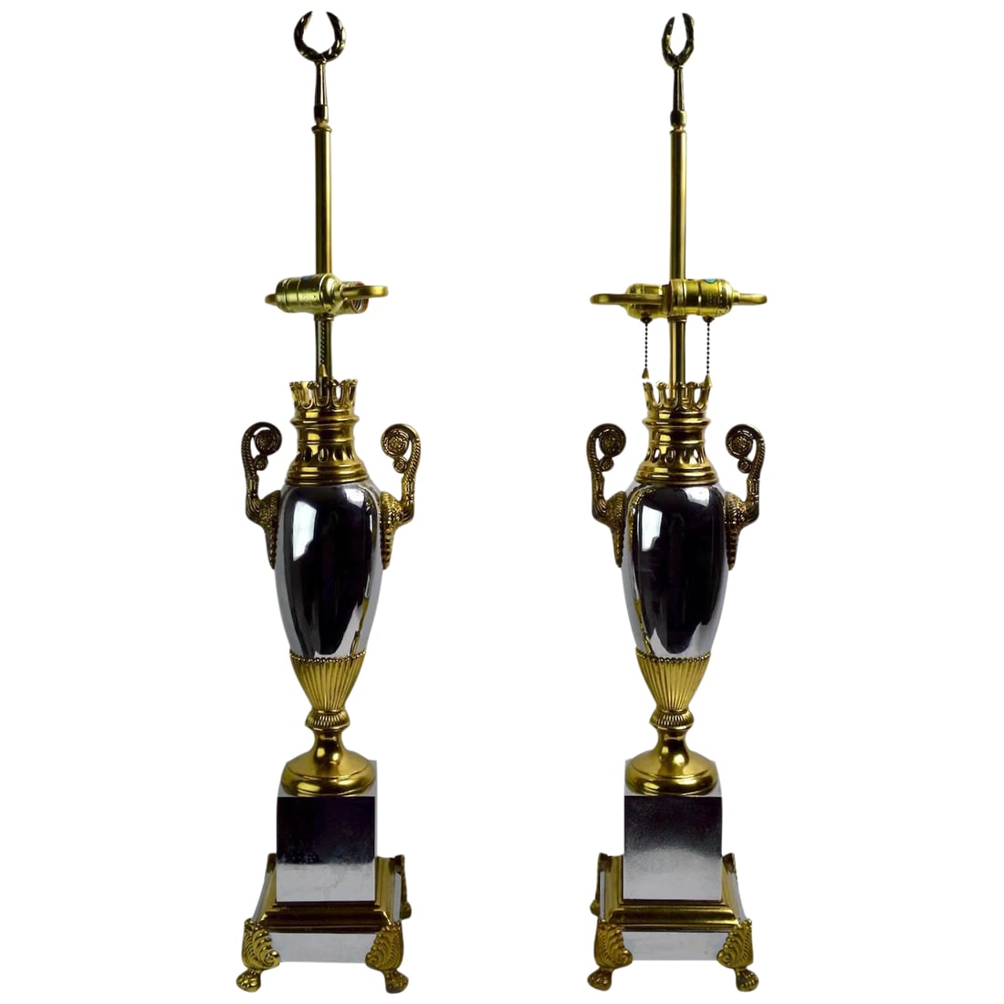 Hollywood Regency Lamps by Tyndale - a Pair: Pair of chrome and brass table lamps by Tyndale, a division of Frederick Cooper. Elegant style shows both Classical and Modernist influence, making these lamps suitable for a wide variety of interior 