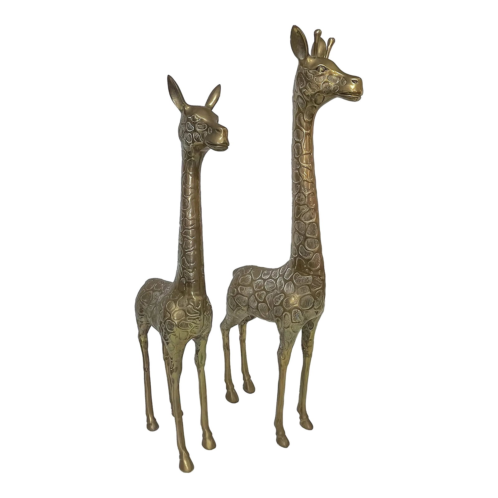 Vintage Hollywood Regency Heavy Brass Giraffe Sculptures Handcrafted in Korea- a Pair: An exceptional pair of Hollywood Regency style giraffe sculptures from the mid 20th century. The male and female pair are made of heavy brass with incredible detail from their sweet faces to their