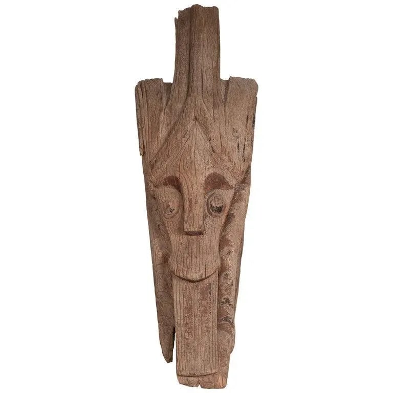 Large Hand Carved Singa Singa Tribal Carving from the Batak People, Sumatra: A large antique hand carved tribal sculpture from the Batak People, northern Sumatra, called a Singa Singa. Attracting our eye with its charismatic presence, this large hand carved sculpture from the