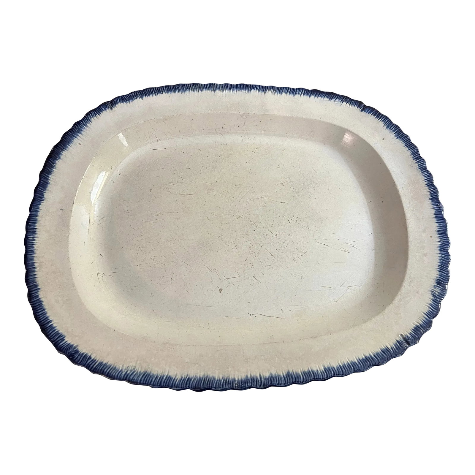 Antique Pearlware Blue Feather Edge Platter, Circa 1820's: A Very Nice Antique Pearlware Blue Feather Edge Platter, Circa 1820's Made in England, circa 1820's Pearlware with a blue feather or shell edge. Glazed earthenware. Size: 16 1/4" by 13" and 1 3/4"