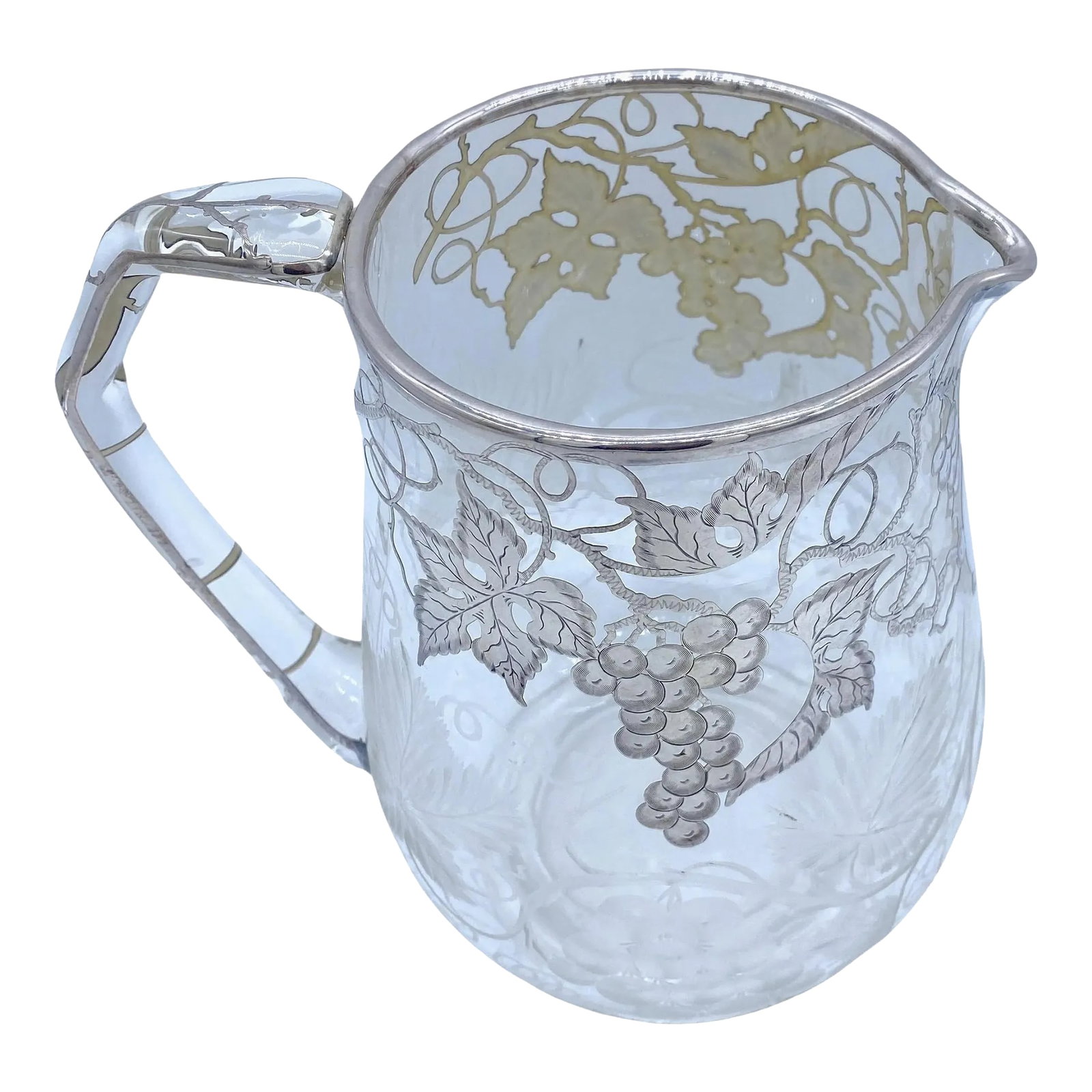 American Engraved Grape Motif & Silver Overlay Crystal Pitcher, Possibly Hawkes: American Engraved Grape Motif & Silver overlay Crystal Pitcher, Possibly Hawkes Unmarked, Circa 1900 Indulge in the timeless elegance of this American Engraved Grape Motif & Silver overlay Crystal