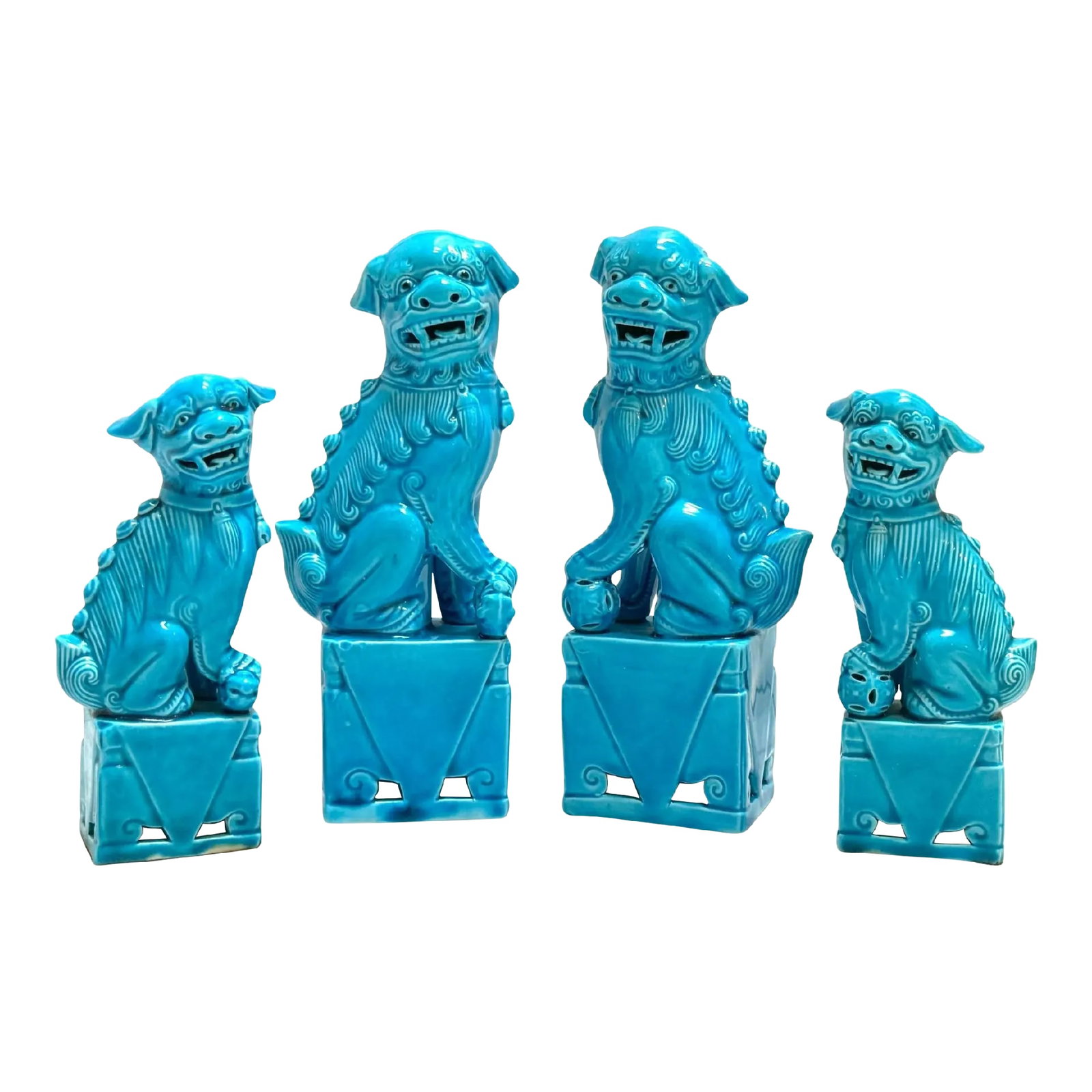 Turquoise Chinese Export Foo Dogs - Set of 4: A Collection of Two Pairs of Turquoise Chinese Export Foo Dogs China, 20th century An instant collection of two pairs of Chinese export porcelain foo dogs, made in the 20th century and adorned with a