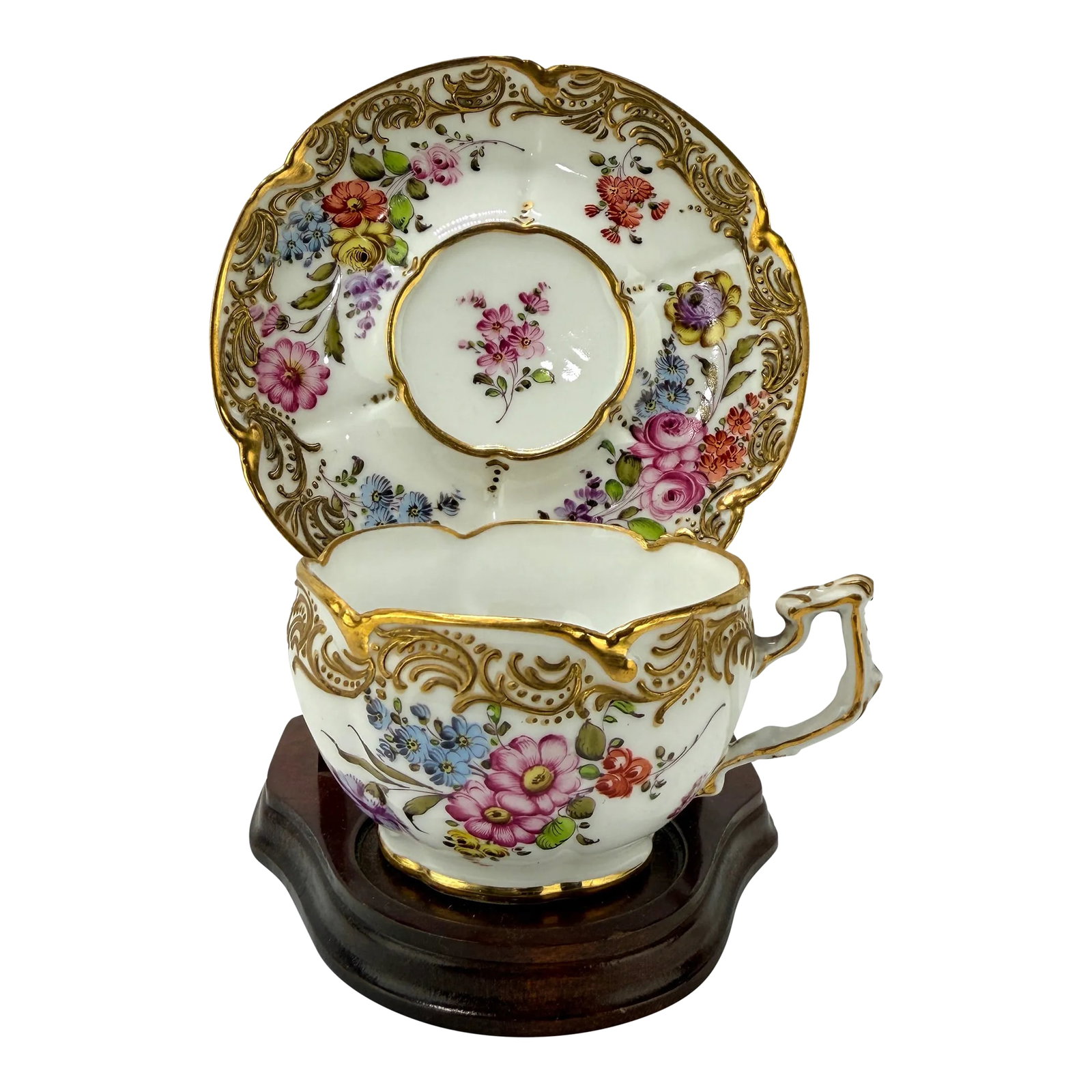 19th Century French, Boudois & Bloch Floral Gold-Trimmed Cup & Saucer Set: An exquisite example of 19th-century French porcelain artistry, this luxurious cup and saucer set bears the mark of the renowned Parisian atelier Boudois & Bloch. Known for their exceptional