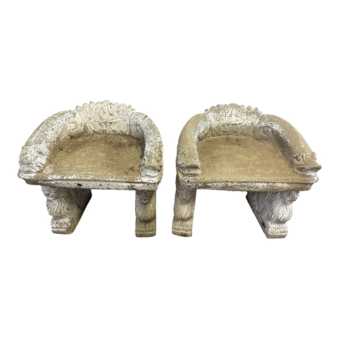 Curved Concrete Garden Seats With Acanthus Leaves and Animals -a Pair: Pair of rare fascinatingly shaped concrete garden seats having rounded backs with leaf decoration and carved animal motif bases. Condition: Alterations: Original Condition Unaltered Imperfections: