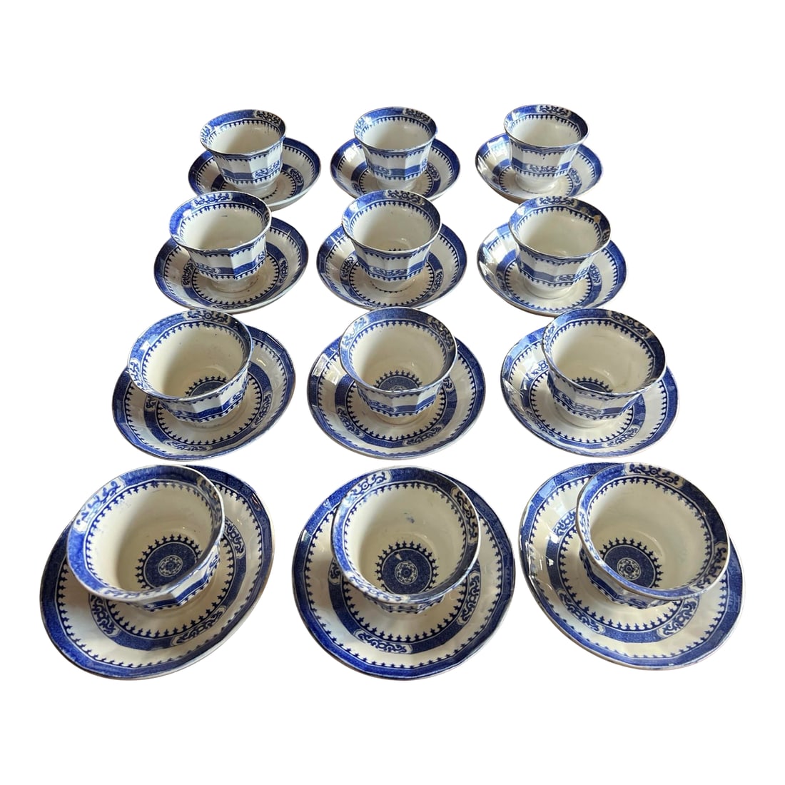 Mid 19th Century 12 Antique Blue Transfer Decorated Cup & Saucers, "Dagger Border" by J. Wedgwood: 12 Antique Blue Transfer Decorated Cup & Saucers, "Dagger Border" by J. Wedgwood Made by John Wedgwood, of Tunstall/Burslem, Staffordshire 1841-1860 Marked: "Border Dagger", and "J. Wedgwood" Size: