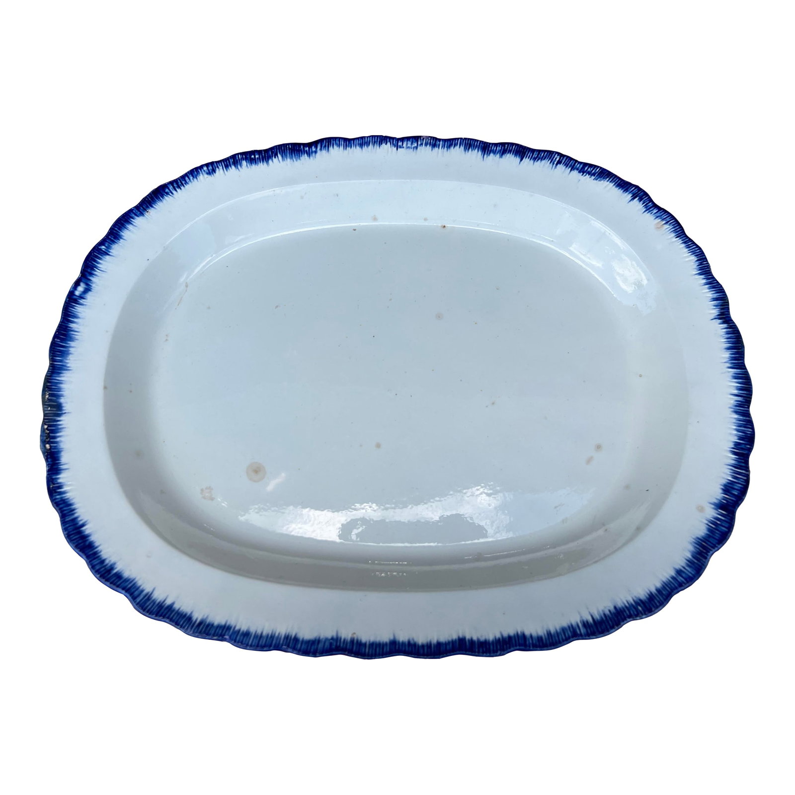 Antique Pearlware Blue Feather Edge Platter, Circa 1820's: Antique Pearlware Blue Feather Edge Platter, Circa 1820's Made in the Staffordshire district of England, circa 1810-1830 Blue glazed feather edge, with a pearlware clay body. Size: 18 1/4" by 14