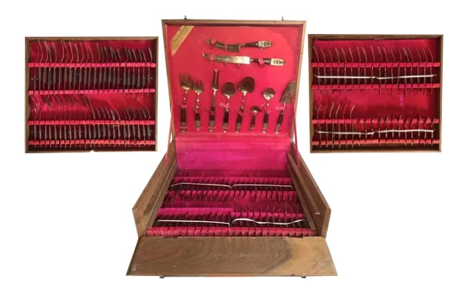 Mid-Century Modern Thai Siam Buddha Brass and Rosewood Flatware Set of 142: Here is a gorgeous set of brass and rosewood flatware and serving pieces. Each piece has a beautiful portrait of the Buddha. There are so many options here and perfect for your dinner parties! There a